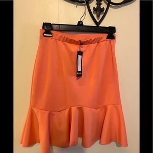 🛑 NASTY GAL🌺SCUBA FLIPPY HEM MINI SKIRT CORAL US SIZE 6 /UK SIZE 10 NWT